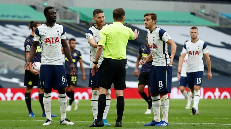 Matt Doherty complains to referee Peter Bankes after Tottenham conceded a late penalty against Newcastle. Photograph: Andrew Boyers/AFP/Getty