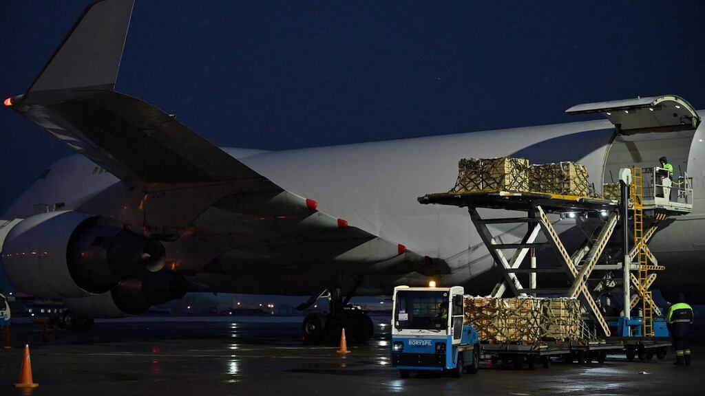A plane carrying US military aid is unloaded at Kyiv’s Boryspil airport in Ukraine. Irish citizens have been advised to leave Ukraine on commercial flights immediately. Photograph: Getty