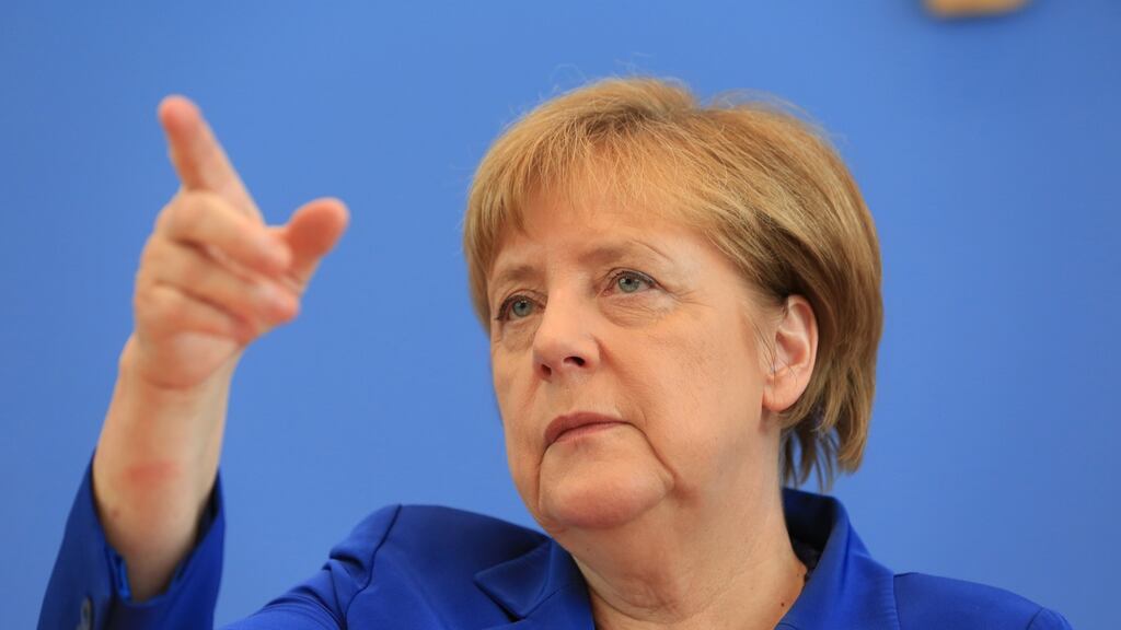 Angela Merkel gestures during a news conference in the Federal Press Conference building in Berlin, Germany, on Thursday, July 28th, 2016. Photograph: Krisztian Bocsi/Bloomberg