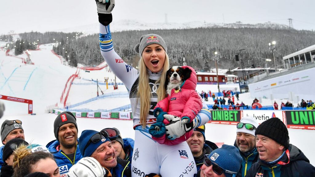 Lindsey Vonn celebrates with the US team after placing third in the Women’s Downhill event in Are, Sweden. She is the most successful woman skier of all time, with a record 20 World Cup titles to her name and 82 victories on the circuit. Photograph: Anders Wiklund/AFP/Getty Images