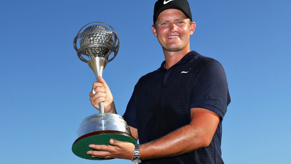 Tom Lewis celebrates his victory in the Portugal Masters. Photograph: Warren Little/Getty