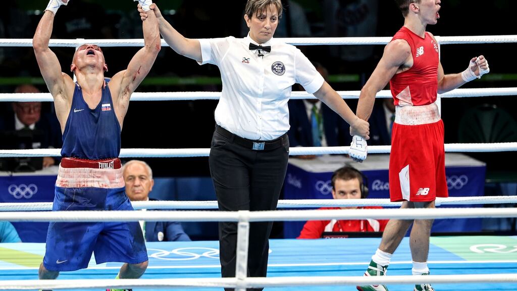 Men’s bantamweight quarter final betweek Mchael Conlan (red) and Vladimir Nikitin (blue). Photograph: Dan Sheridan/Inpho