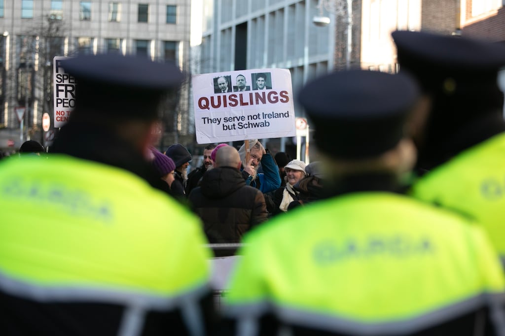 Gardaí and anti-Government protesters during the first day back of the Dáil in Dublin's city centre in January. TDs and Senators always used to engage with protest groups and speak to the people assembled on Kildare Street, but not any more. Photograph: Gareth Chaney/Collins