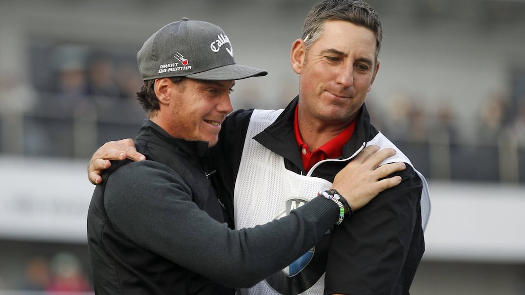 Kristoffer Broberg celebrates with his caddy after winning the BMW Masters at Lake Malaren Golf Club in Shanghai. Photograph: Aly Song/Reuters