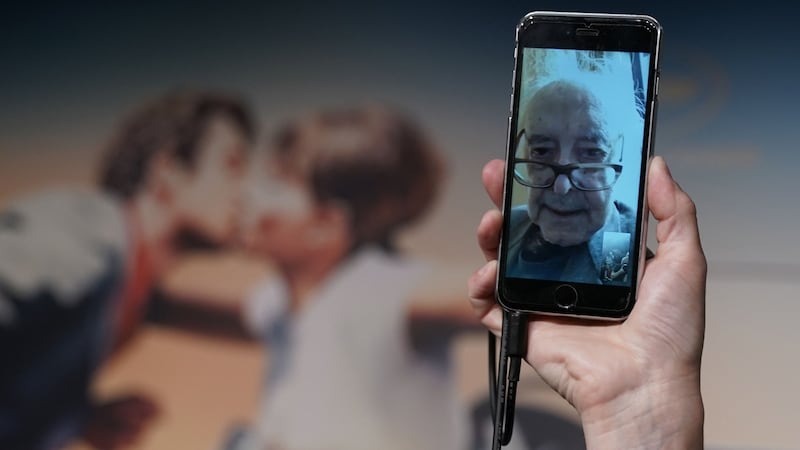 French-Swiss director Jean-Luc Godard addresses a press conference through a mobile phone video link, from his home in Switzerland, for his film “The Image Book” at the Cannes Film Festival. Photograph: Getty Images