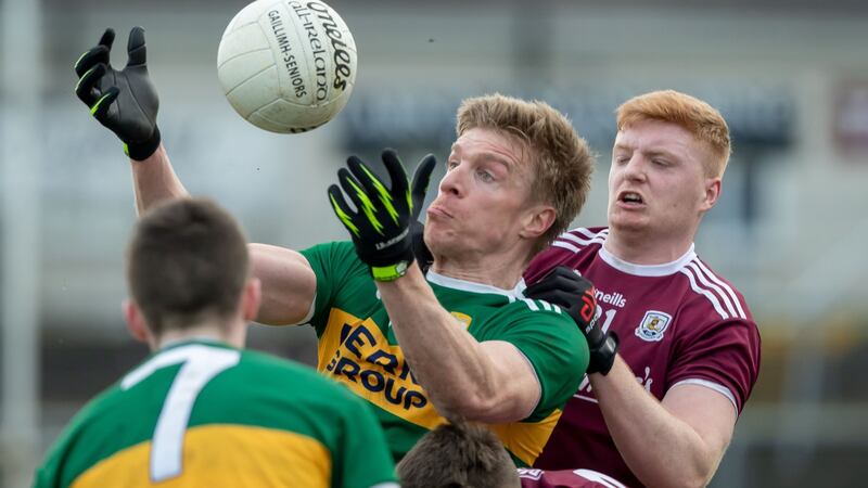 Galway’s David Cunnane with Tommy Walsh of Kerry. Photo: Morgan Treacy/Inpho