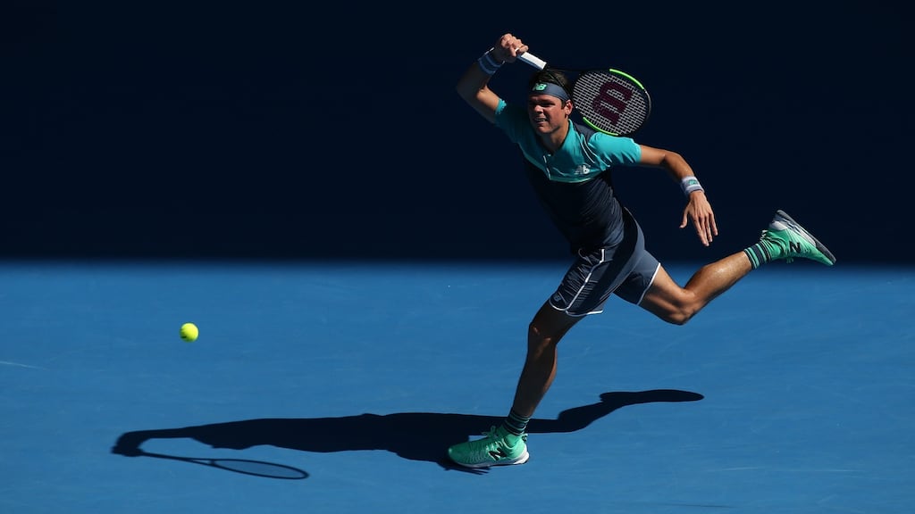 Milos Raonic of Canada in action against Alexander Zverev of Germany during their round four men’s singles match at the Australian Open in Melbourne. Photo: Hamish Blair/EPA
