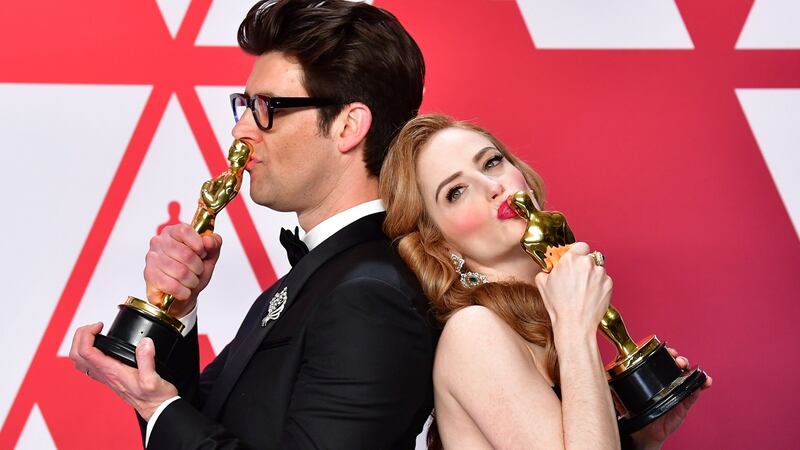 Best Live Action Short Film winners for ‘Skin’ director Guy Nattiv, and his wife actress Jaime Ray Newman. Photograph: FREDERIC J. BROWN / AFP)FREDERIC J. BROWN/AFP/Getty Images