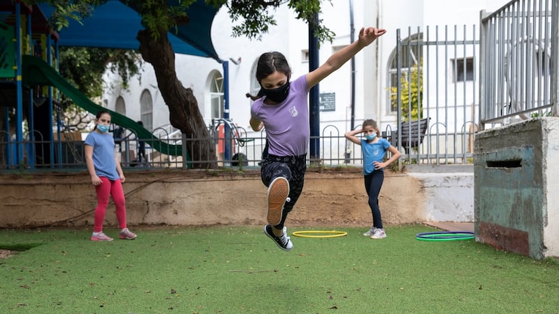 Children play in Tel Nordau school in Tel Aviv on May 5th, the day it reopened after a six-week coronavirus lockdown. Photograph: Guy Prives/Getty Images