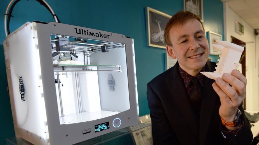 Nigel Burke of 3D Printing Dublin, Rathmines, with a castle his son designed. Photograph: Brenda Fitzsimons