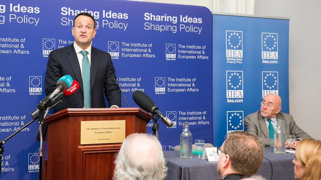 Institute of International and European Affairs chairman Ruairí Quinn (right) looks on as Taoiseach Leo Varadkar addresses the institute in Dublin on Friday. Photograph: Gareth Chaney/Collins