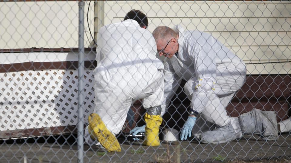 FBI agents search a house on the same street as a home where three Cleveland women were found alive after vanishing in their own neighborhood about a decade ago. Photograph: John Gress/Reuters