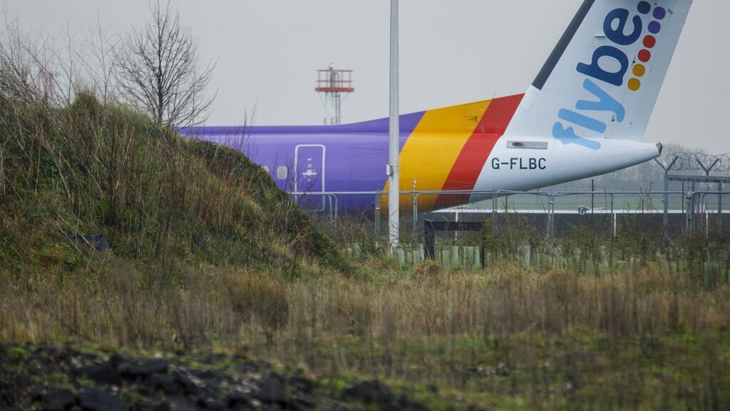 A grounded Flybe aircraft  at Exeter airport in the UK. The collapsed airline operated 14 routes from  Belfast City Airport. Photograph: Bloomberg