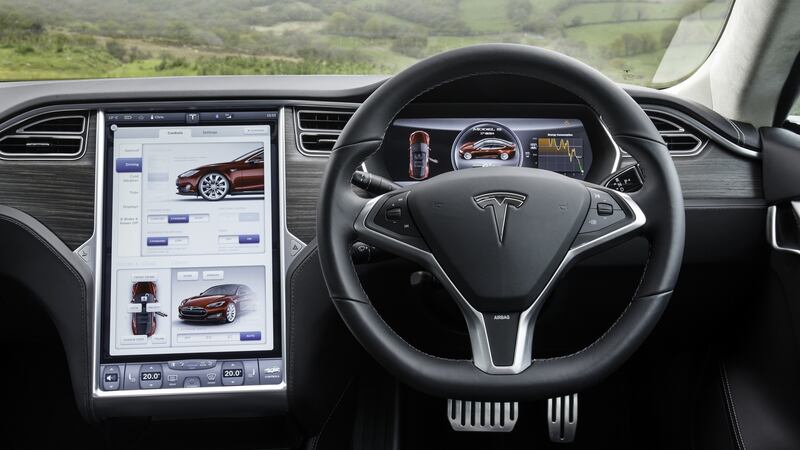 Tesla’s interior displaying its touchscreen system
