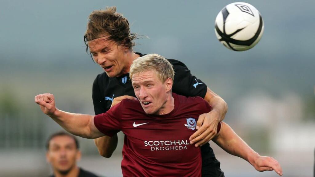 Drogheda’s Paul O’Conor and Malmo’s Markus Halsti during last night’s Europa League qualifying round 1st Leg in Tallaght. Photograph: Donall Farmer/Inpho