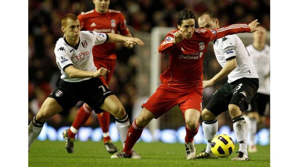 Liverpool's Fernando Torres, seen here in action against Fulham, was the subject of a €40 million bid from Chelsea. - (Photograph: Phil Noble/Reuters)
