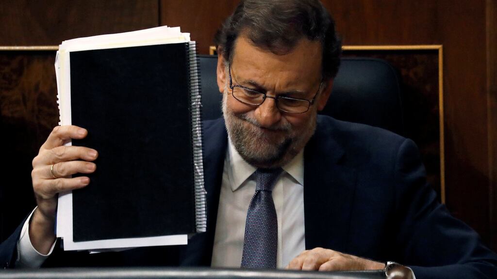 Spain’s acting prime minister and People’s Party leader Mariano Rajoy reacts during an investiture debate at parliament in Madrid on Wednesday. Photograph: Juan Medina/Reuters