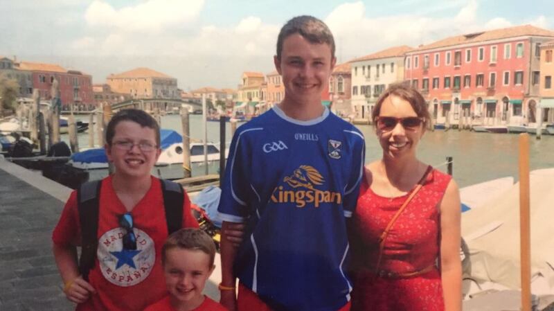 Clodagh Hawe and her sons. From L-R: Niall, Ryan, Liam and Clodagh Hawe Photograph: Jacqueline Connolly