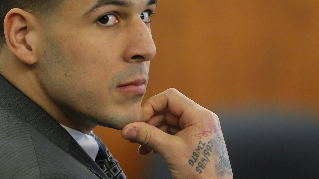 Former New England Patriots football player Aaron Hernandez listens as prosecution witness Alexander Bradley testifies at Bristol County Superior Court in Fall River, Massachusetts in 2015. Photo: Brian Snyder/Reuters