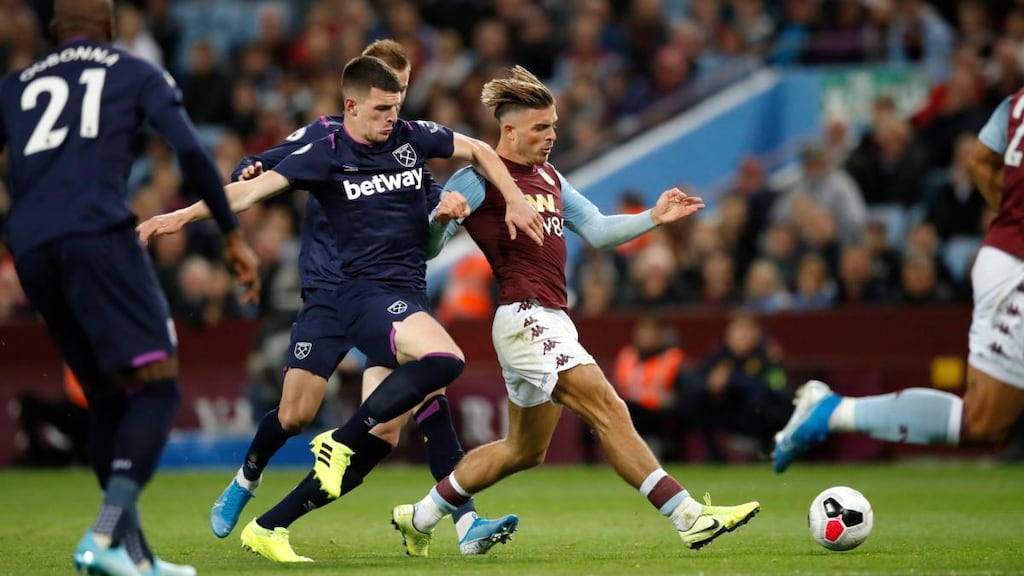 Declan Rice challenges Jack Grealish during West Ham’s draw at Aston Villa. Photograph: Martin Rickett/PA