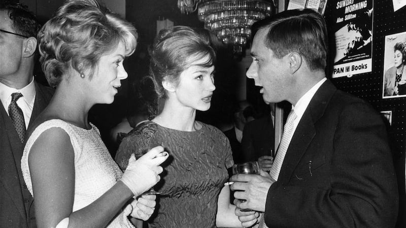Alan Sillitoe, author of ‘Saturday Night and Sunday Morning’ and actresses in the film of the book, Shirley Anne Field, (centre), and Rachel Roberts at a party in Belgrave Square, London, in August 1960. Photograph: Evening Standard/Getty Images