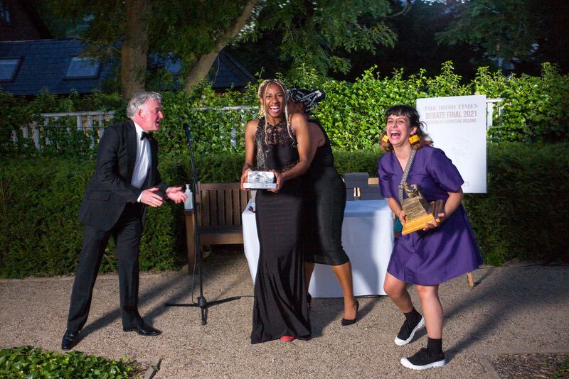 Liam Herrick of the Irish Council for Civil Liberties with 2021 team winners Chikemka Abuchi-Ogbonda and Rí Anunudu of Maynooth University, and individual winner Gabrielle Fullam of TCD Hist. Photograph: Jon Ohle