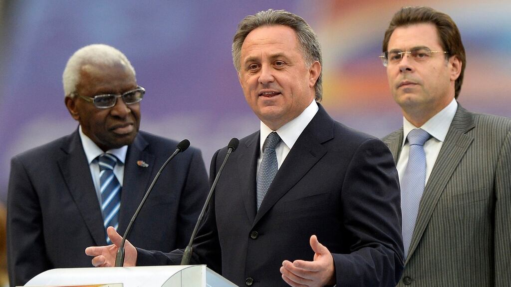 Russian Sports Minister Vitaly Mutko (centre) and former IAAF president Lamine Diack (left), who is alledged to have received €1M in bribes. Photograph: EPA.
