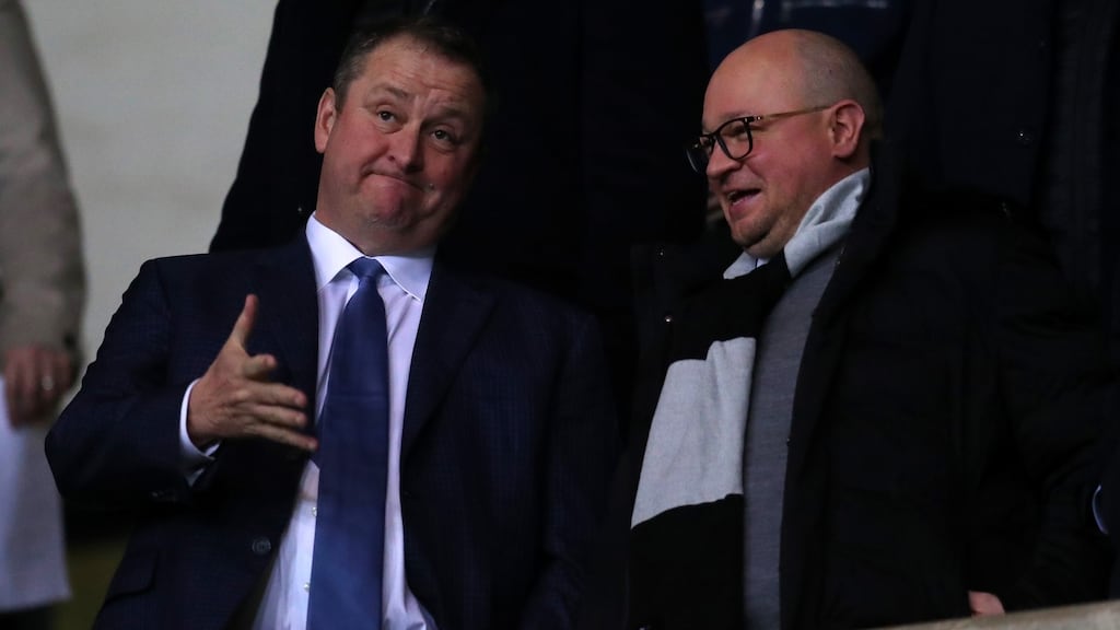 Newcastle United owner Mike Ashley speaks to Lee Charnley. Photo: Catherine Ivill/Getty Images