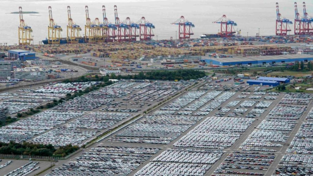 Cars for export stand in a parking area at a shipping terminal in the harbour of the German northern town of Bremerhaven. German Institute for Economic Research said a co-ordinated European response was urgently needed, given flat euro zone growth in the second quarter and a 0.2 per cent contraction in Germany.