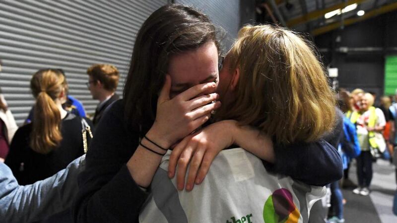 Activists react at the count centre as votes are tallied following yesterday’s referendum in Dublin, Ireland. Photograph: Clodagh Kilcoyne/Reuters