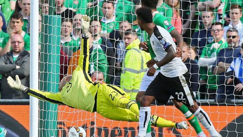 Beaten: Martin Hinteregger’s shot passes Darren Randolph. Photograph: Paul Faith/AFP/Getty