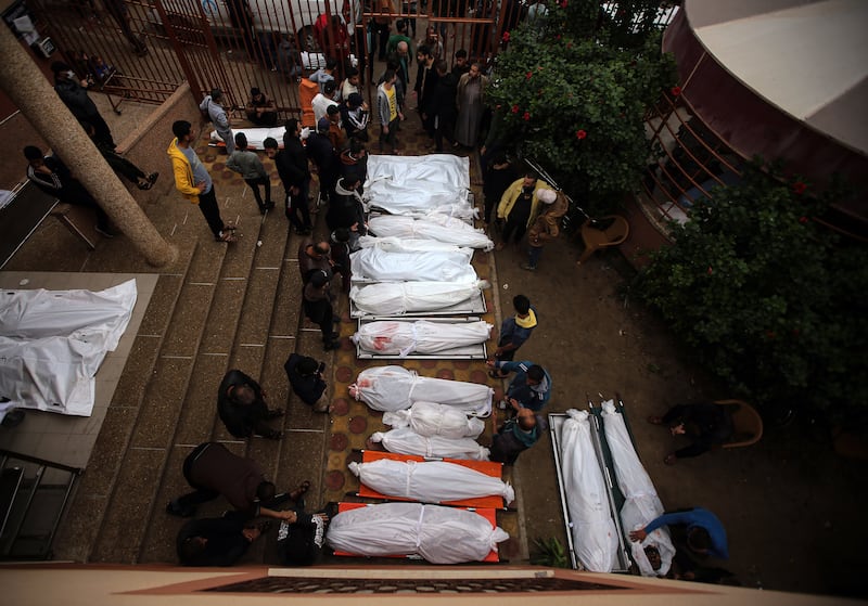 The bodies of people killed in Israeli airstrikes are brought to the morgue at Nasser Hospital in Khan Younis. Photograph: Yousef Masoud/New York Times