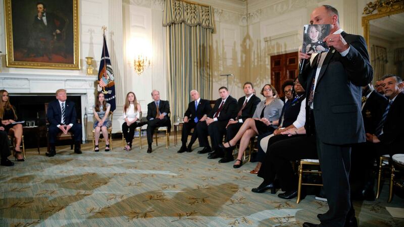 Sandy Hook parent Mark Barden holds a photo of his deceased son Daniel, a victim of the Sandy Hook School shooting in Connecticut. Photograph: Jonathan Ernst / REUTERS