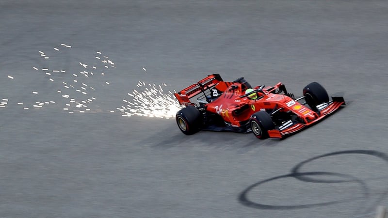 Sparks fly from the back of Mick Schumacher’s Ferrari during testing in Bahrain. Photograph: Hamad I Mohammed/Reuters