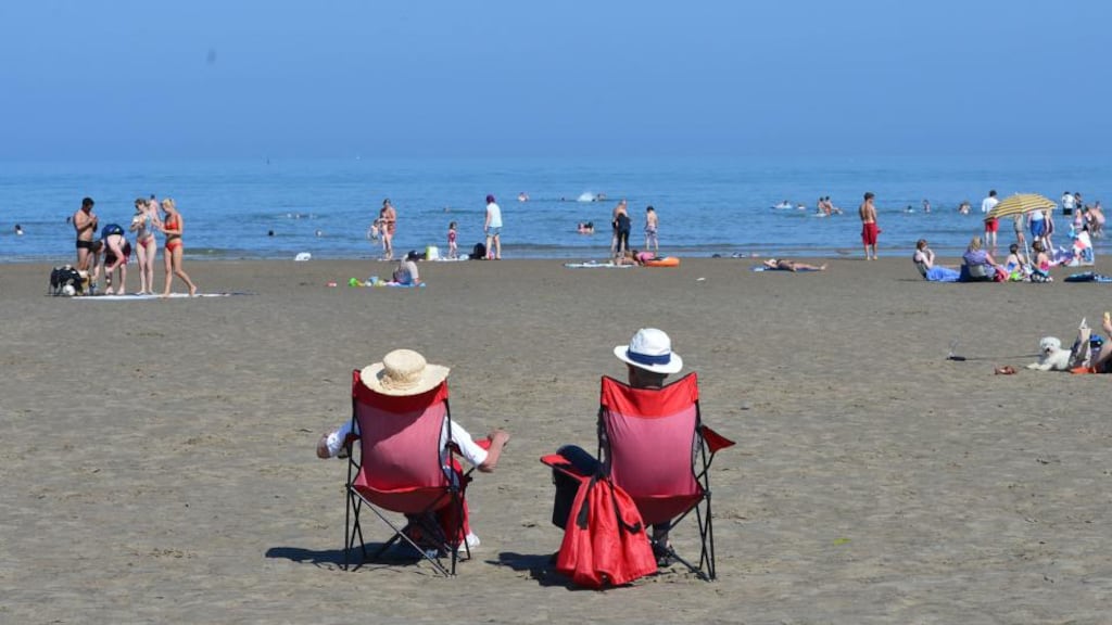 Anne and Niall Marron from Lucan enjoy the sunshine on Portmarnock beach last month. Photograph: Alan Betson/The Irish Times