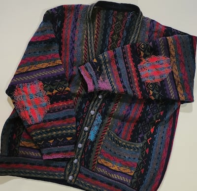 A cardigan mended by Project Prolong