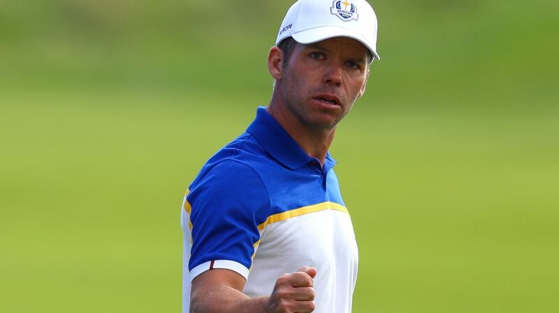 Paul Casey celebrates his putt on the 18th during his match against Brooks Koepka. Photograph:  Oisín Keniry/Inpho