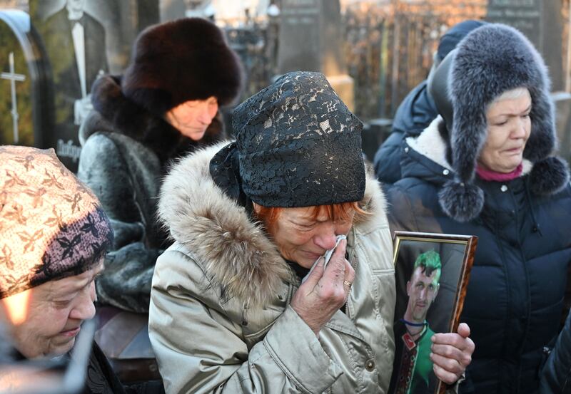 Olena Ignatenko, mother of Volodymyr Vakulenko, during his funeral in Kharkiv on December 6th, 2022. Photograph: Sergey Bobok/AFP via Getty Images