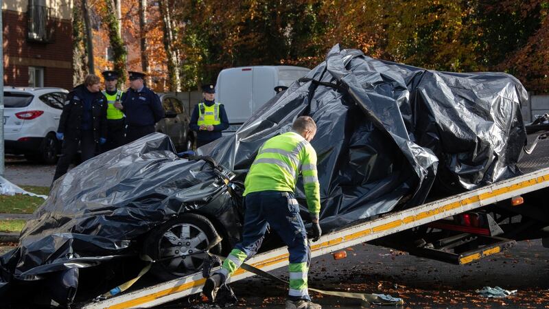 Gardaí remove the vehicle from the scene on Mount Andrew Court in Lucan. Photograph: Collins