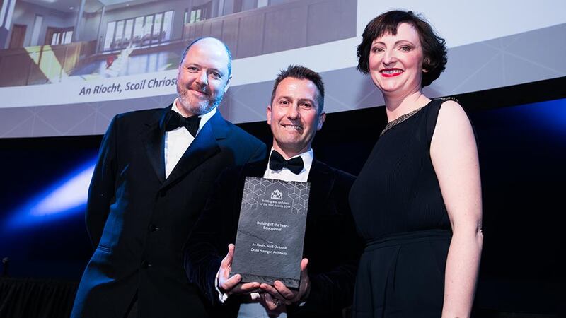 Stephen Pierce, Area Sales Manager, Vescom presents the Building of the Year - Educational award to Conor Hourigan & Ailish Drake, Drake Hourigan Architects.