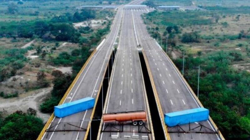 Two semi-trailers loaded with boxed emergency food and medicine are now at the border of Columbia and Venezuela. Edinson Estupinan/AFP/Getty