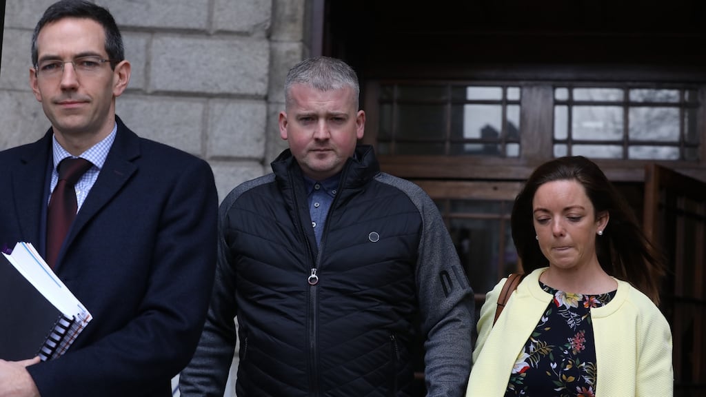 From left: solicitor Roger Murray with Michael Carpenter and Lisa Keily  leaving the Four Courts on Tuesday. Photograph: Collins