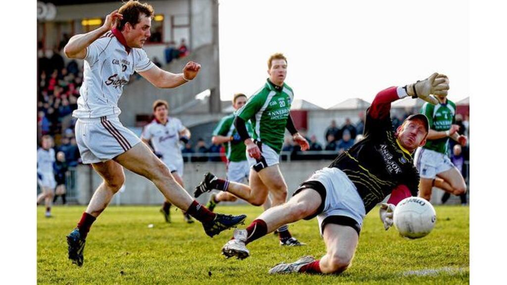 Westmeath's goalkeeper Gary Connaughton saves a goal bound effort from John O'Brien of Galway. photograph: james crombie/inpho