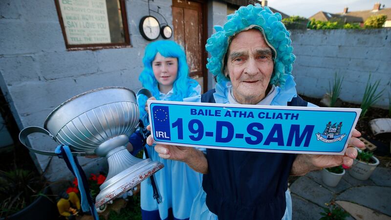 Tony Broughan with his grandson Tighe, who will carry on the family tradition and dress as Molly Malone when attending Dublin’s matches. Photograph: Nick Bradshaw