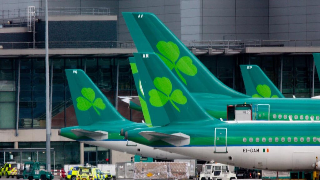 Aer Lingus: the airline no longer allows passengers to bring one 10kg bag aboard its aircraft at no cost. Photograph: Tom Honan