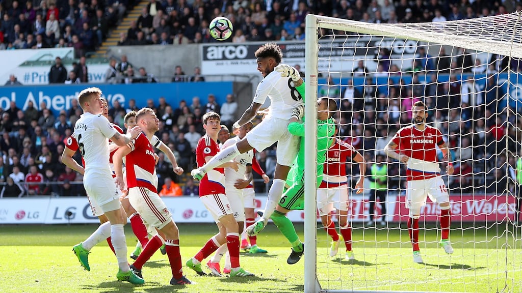 Middlesbrough goalkeeper Victor Valdes claws the ball away as his side managed to escape  Swansea with a point. Photograph: David Davies/PA