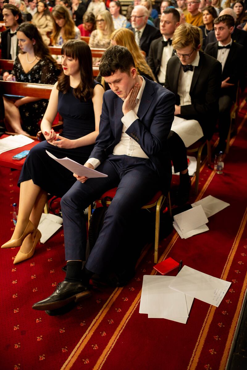 Andy Cullinan of TCD Hist checks his notes at The Irish Times Debate semi-final at the Royal Irish Academy last month. Photograph: Joh Ohle