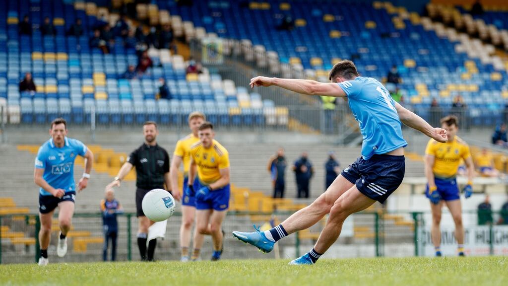 Cormac Costello scores a late point for Dublin from the penalty spot in their win over Roscommon. Photograph: James Crombie/Inpho