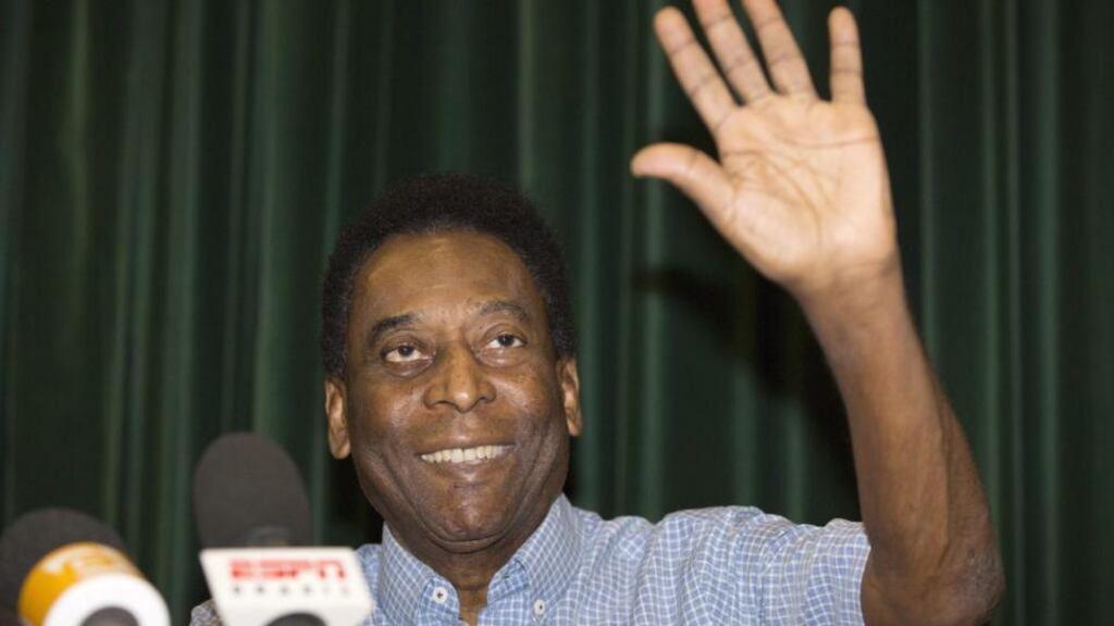 Brazilian former soccer player Edson Arantes do Nascimento ‘Pele’ attends a press conference after being released from hospital in Sao Paulo, Brazil, 09 December 2014. Pele has recovered well from an urinal infection after two weeks under treatment. Photograph: Sebastiao Moreira/EPA