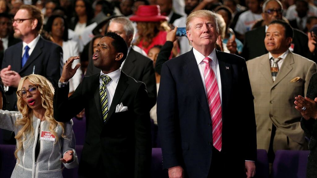 Donald Trump attending a church service, in Detroit, Michigan during the Republican  nomination campaign last September. Photograph:  Reuters/Carlo Allegri